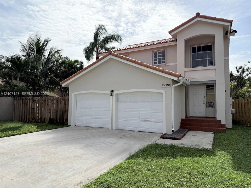 Two Car Garage with Spacious Driveway