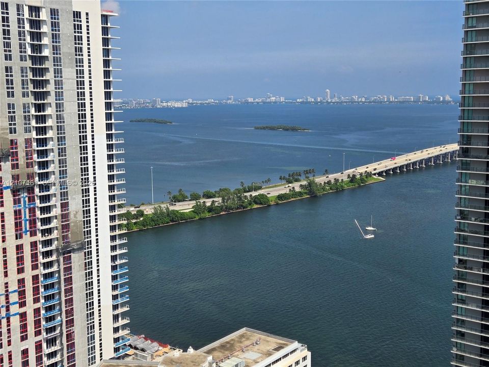 Elevated vantage point featuring expansive coastal, bridge, and cityscape scenery