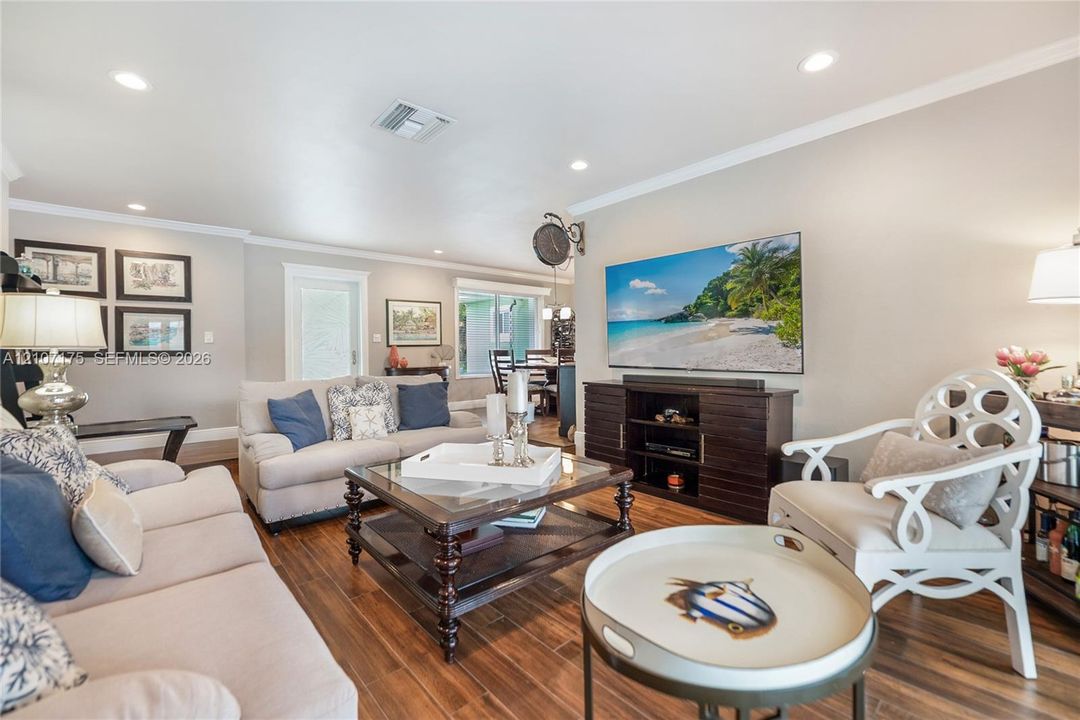 Living area with view of front entry.