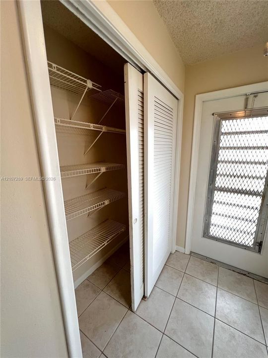 extra closet in entry area