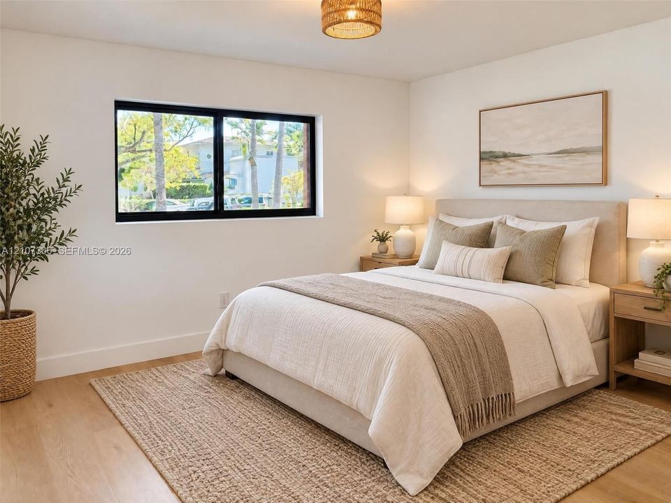 Neutral-toned room with wood-finish flooring, black-framed window, and woven drum ceiling light fixture