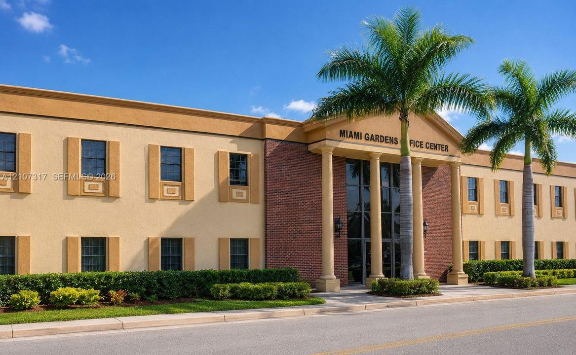 Stucco exterior facade featuring a brick-accented entryway, classical columns, multi-pane windows, and landscaped hedges