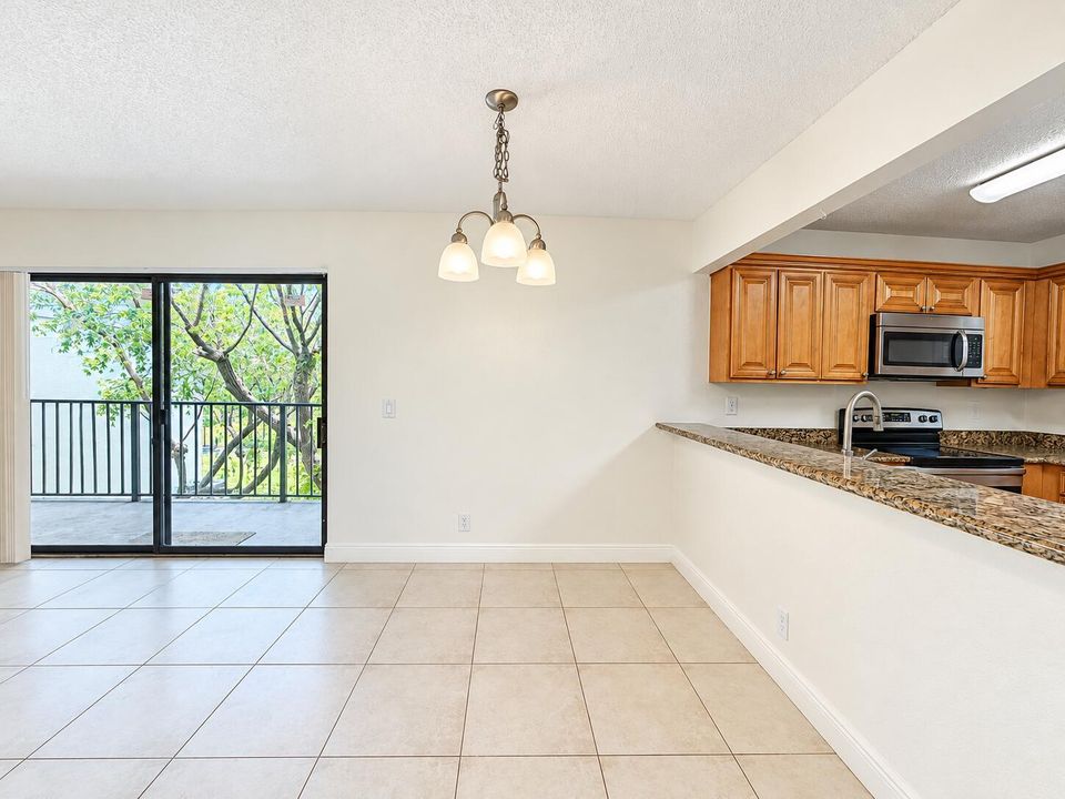 Bright Open Dining Area with Kitchen Vie