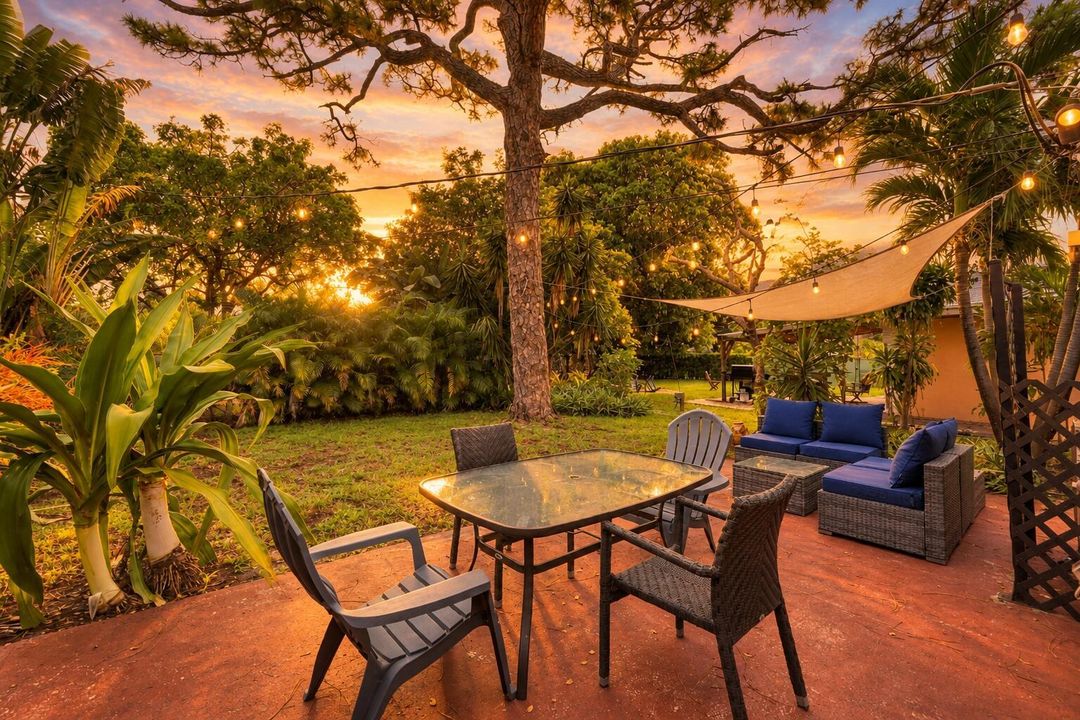 Golden-Hour Tropical Patio Retreat yard