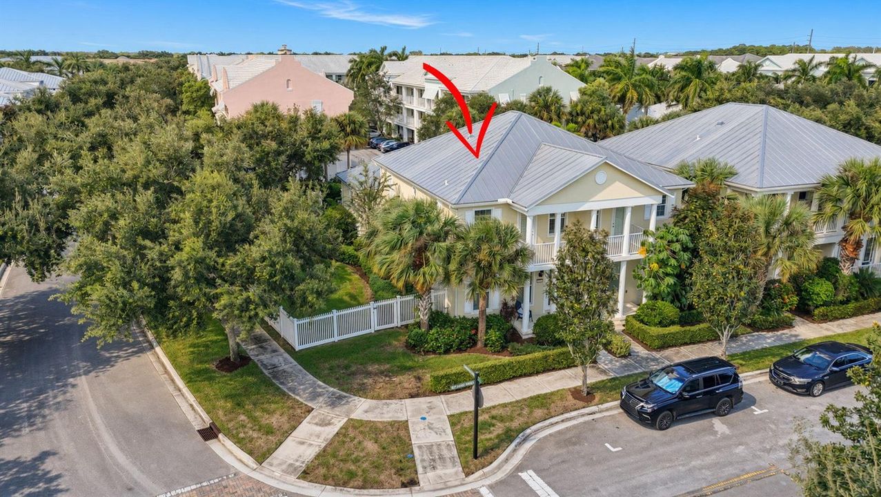 Aerial Coastal Home with Red Arrow
