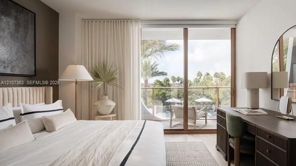 Floor-to-ceiling glass sliding doors, wood-frame balcony enclosure, neutral accent wall, wood-finish flooring, and plaster wall finishes