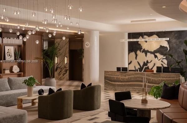 Lobby featuring a multi-pendant orb light installation, custom stone reception desk, floor-to-ceiling wood-finish wall panels, geometric tile flooring, and integrated wall-mounted sconces