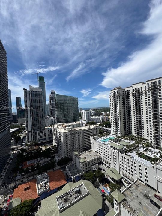 Elevated metropolitan skyline scenery featuring high-rise architecture and dense urban infrastructure