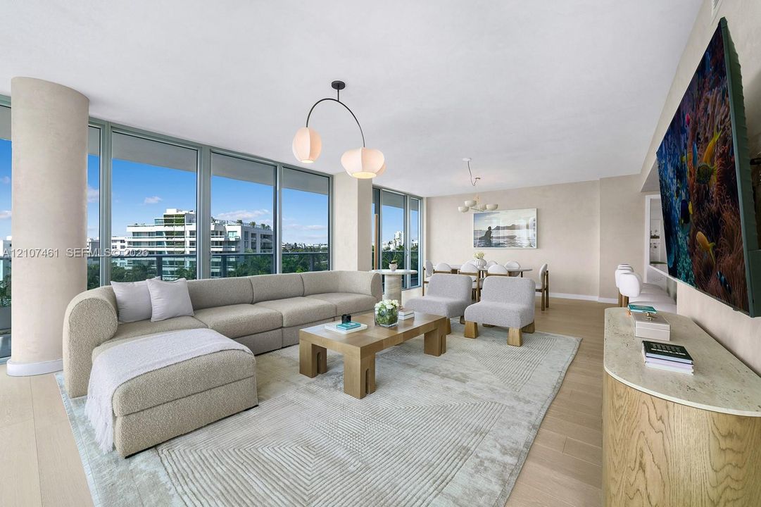 Floor-to-ceiling glass walls, light-toned wood-finish flooring, architectural structural columns, and modern designer light fixtures