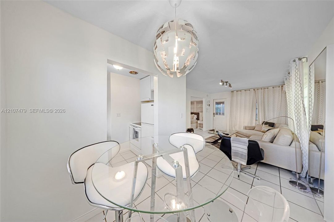 Cottage guest house, Tiled flooring and large-scale spherical pendant lighting
