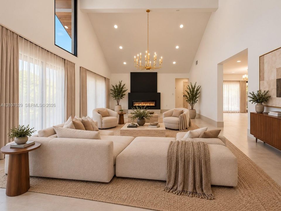 Contemporary residence featuring a smooth white stucco exterior, dark-toned roof shingles, a paved walkway, and modern wall-mounted exterior lighting
