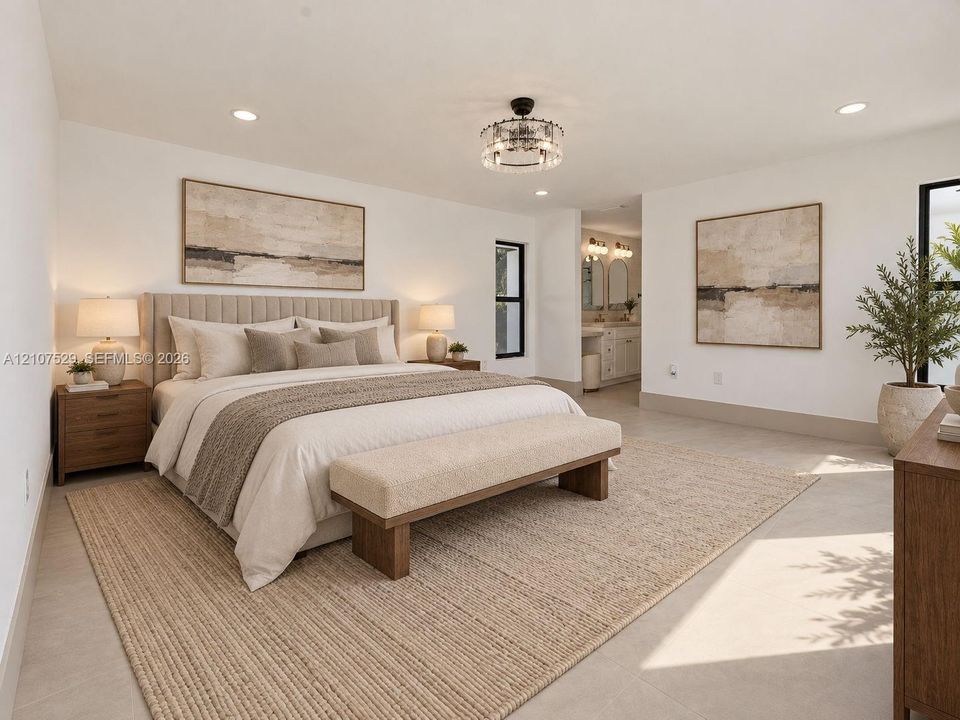 Vaulted ceiling, full-height dark accent fireplace, recessed lighting, chandelier fixture, and tile flooring