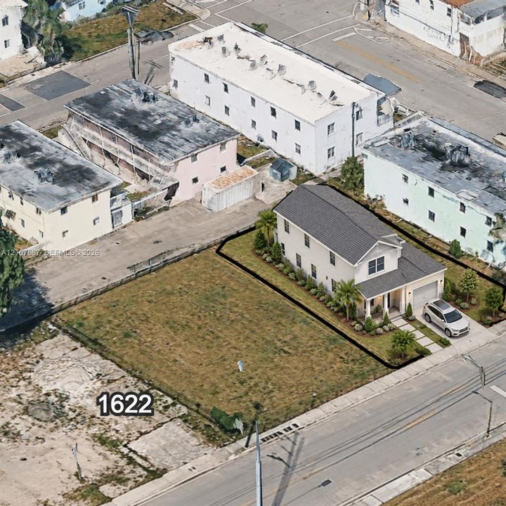 Two-story residence concept featuring a gray shingled roof, attached one-car garage, concrete driveway, and established perimeter landscaping