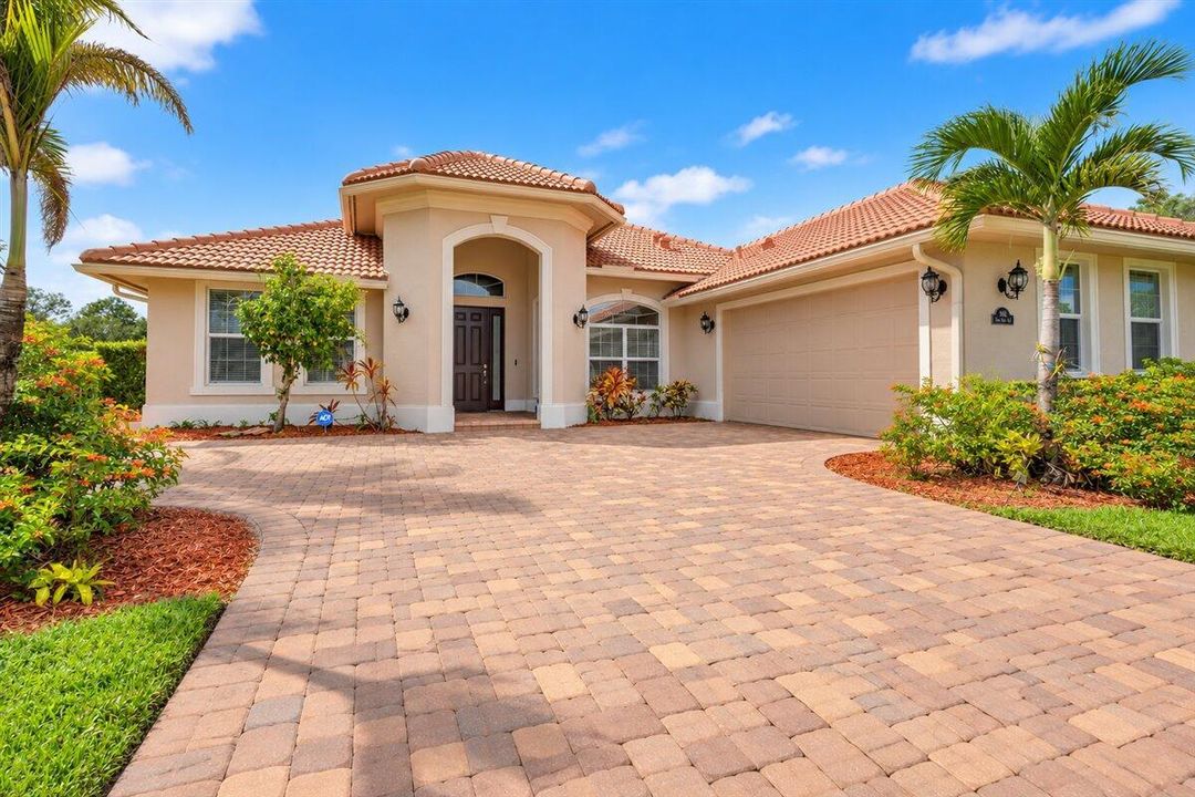 Front Mediterranean Home with Tropic