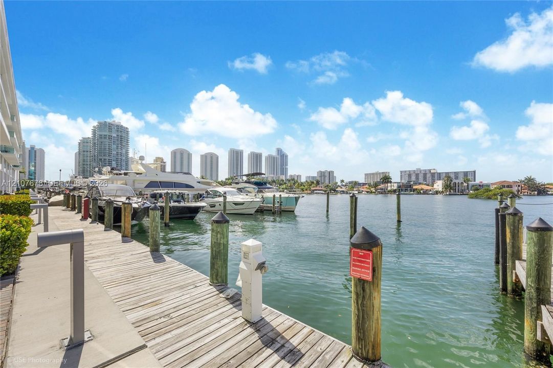 Private deep-water dock featuring wooden decking and integrated mooring pilings