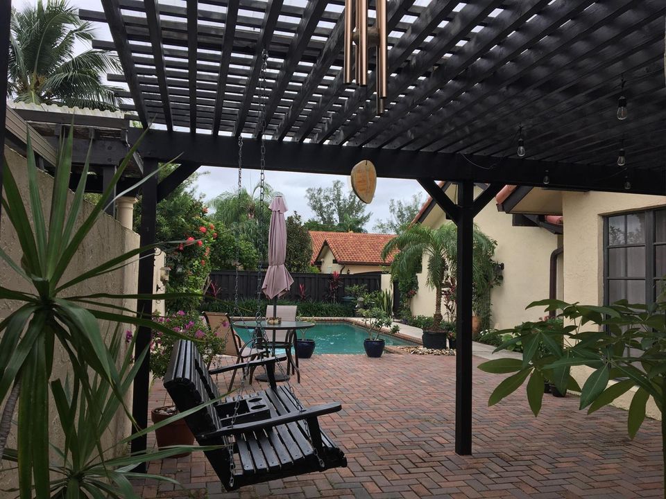 Roof-covered pergola