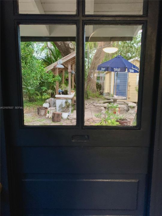 View to backyard area from kitchen door