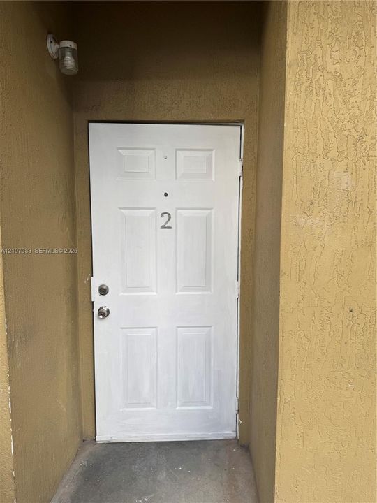 Six-panel White entry door Apt 2 - second Floor