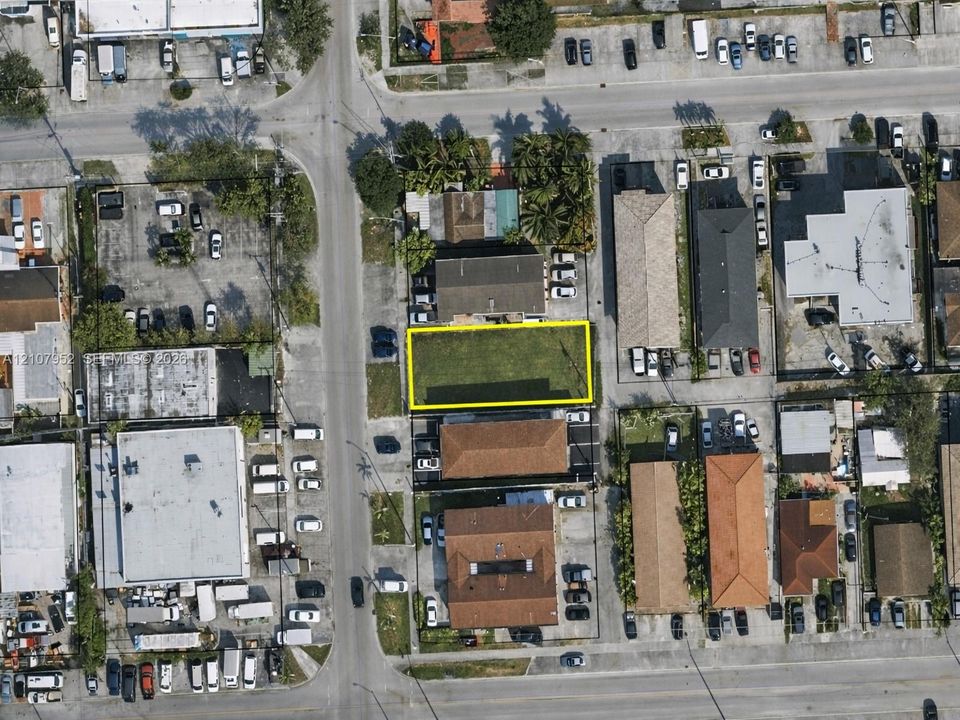 Rectangular parcel featuring cleared land, street access, and perimeter fencing