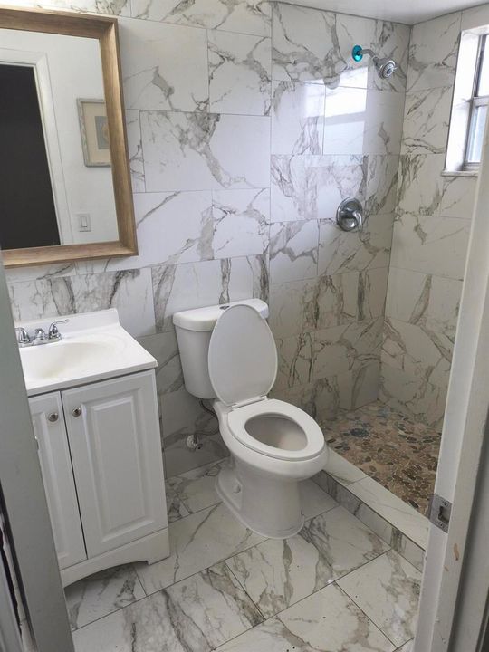 16566