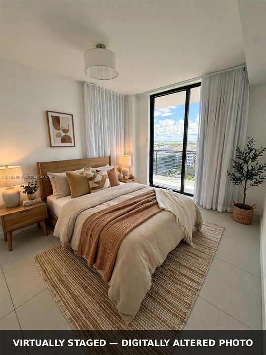Large floor-to-ceiling glass door, neutral tile flooring, drum-style ceiling light fixture, and private balcony
