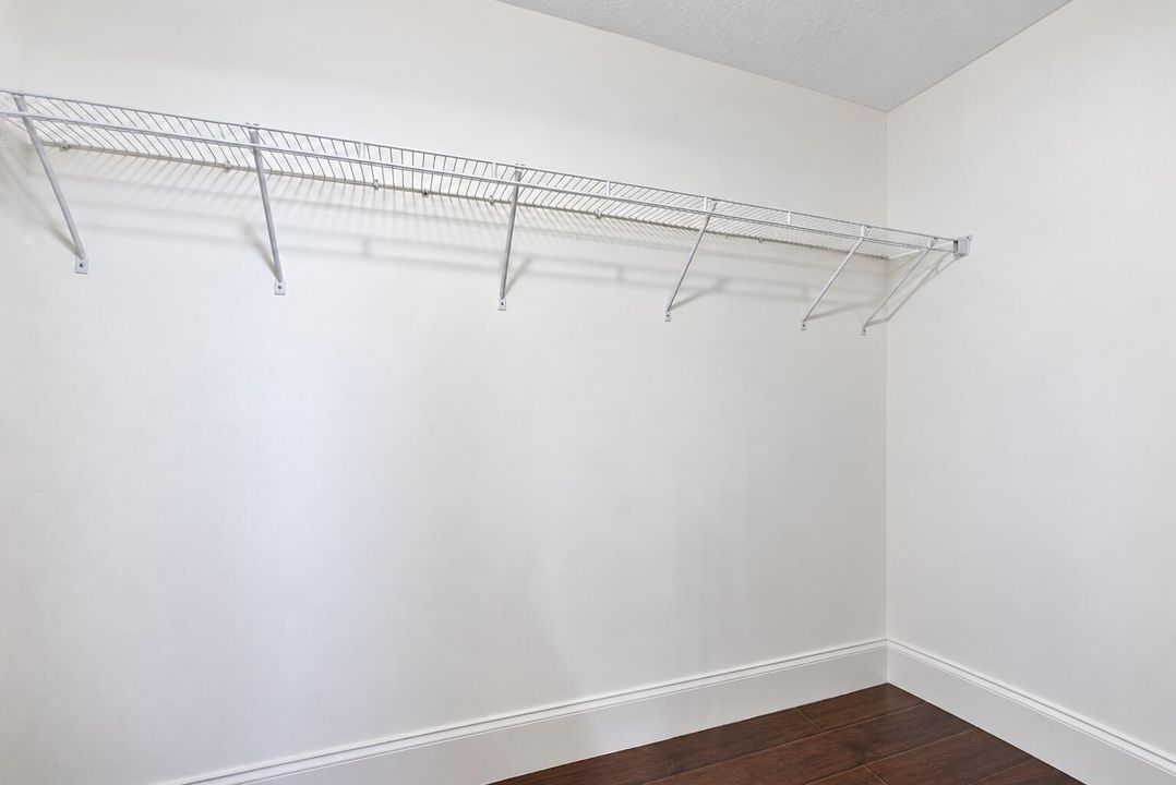 Primary bedroom walk in Closet