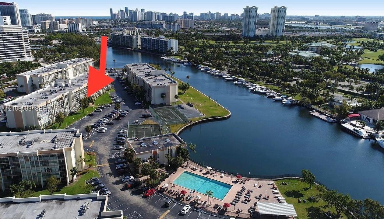BUILDING AERIAL VIEW (Arrow shows the unit's balcony location)