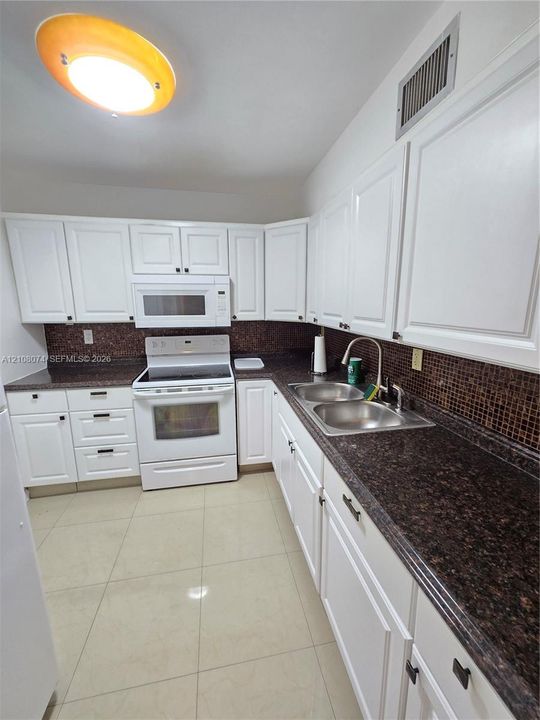 Updated kitchen. Marble countertop