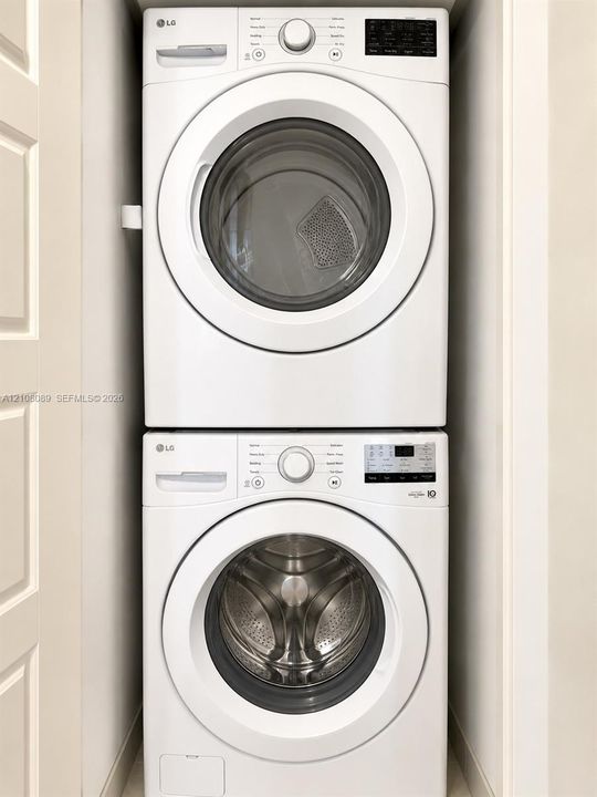 Stacked high-efficiency front-loading washer and dryer unit