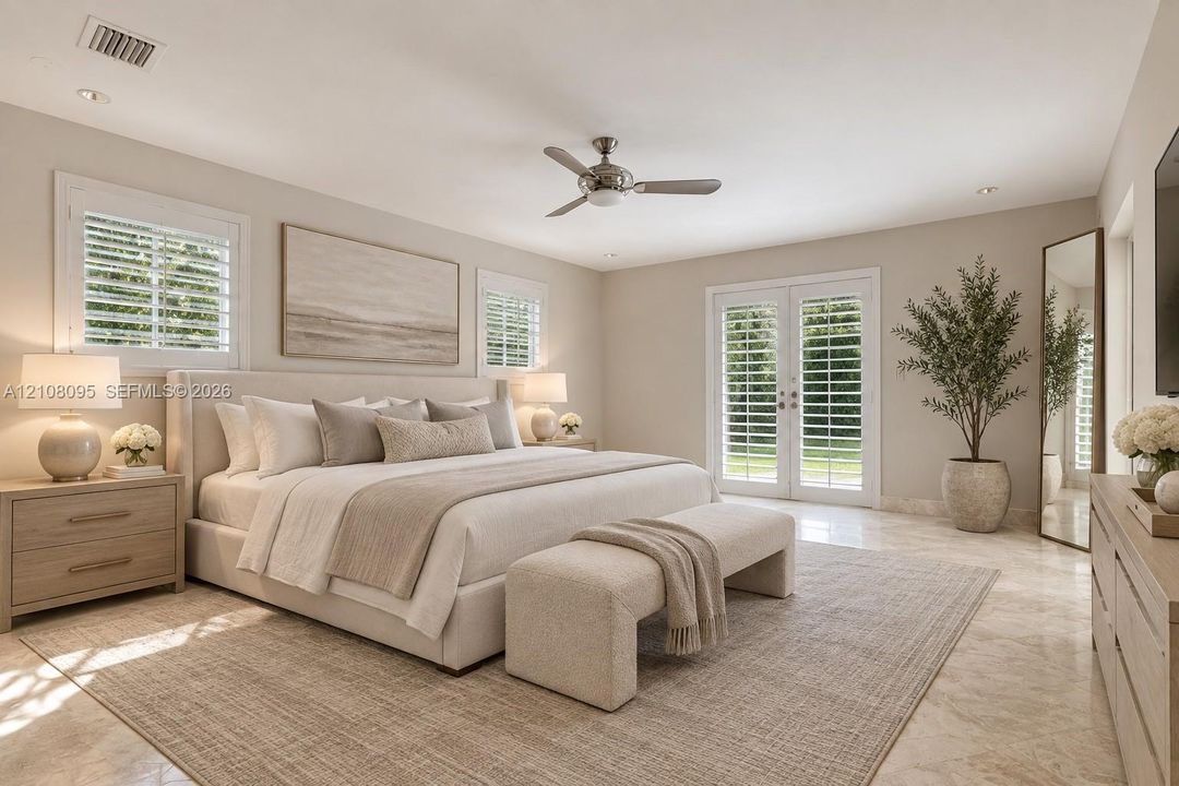 Spacious room featuring polished stone flooring, custom plantation shutters, recessed lighting, and a ceiling fan, complemented by glass-paneled double doors