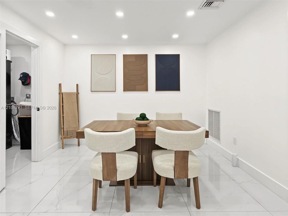 Polished stone-finish flooring and recessed LED lighting throughout
