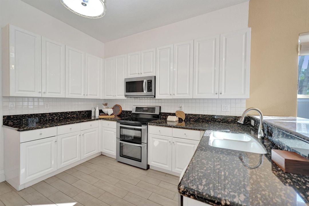 Abundant Cabinetry and Granite Counters
