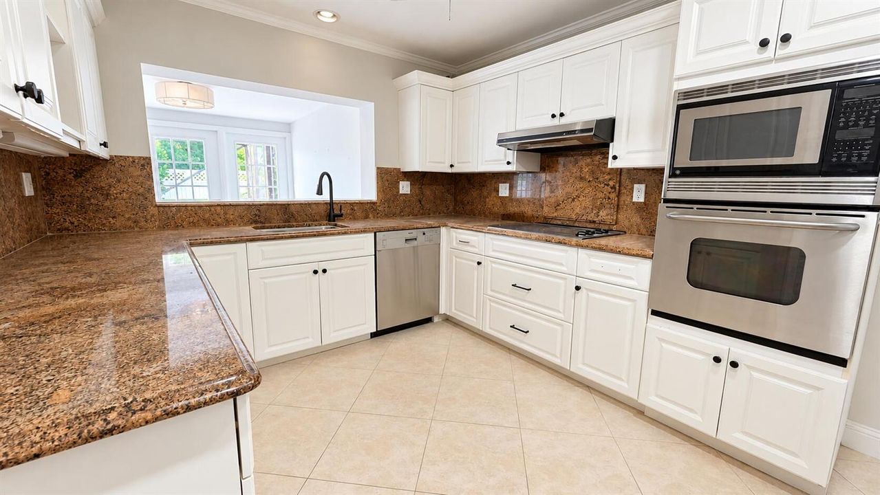 Bright White and Granite Kitchen
