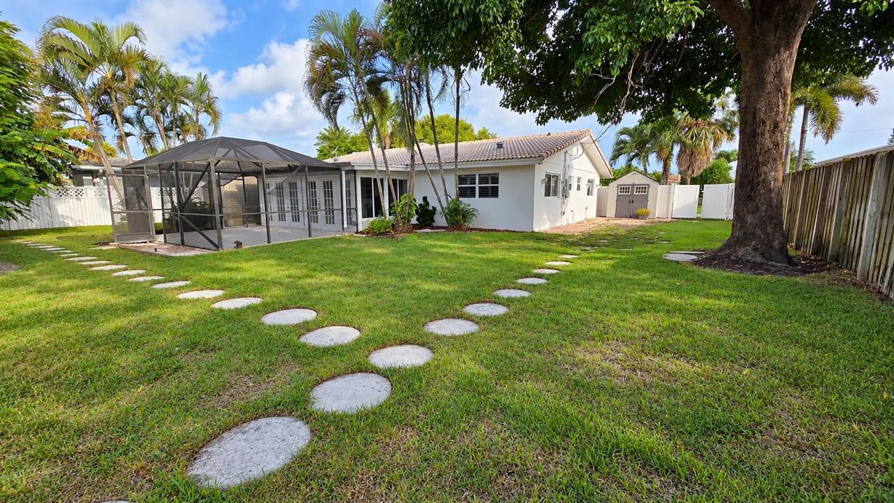 Tropical Backyard with Screened Lanai