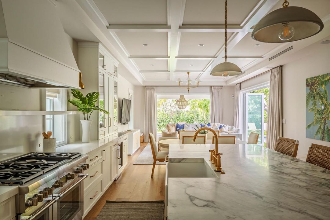 15 - White kitchen with marble waterfall