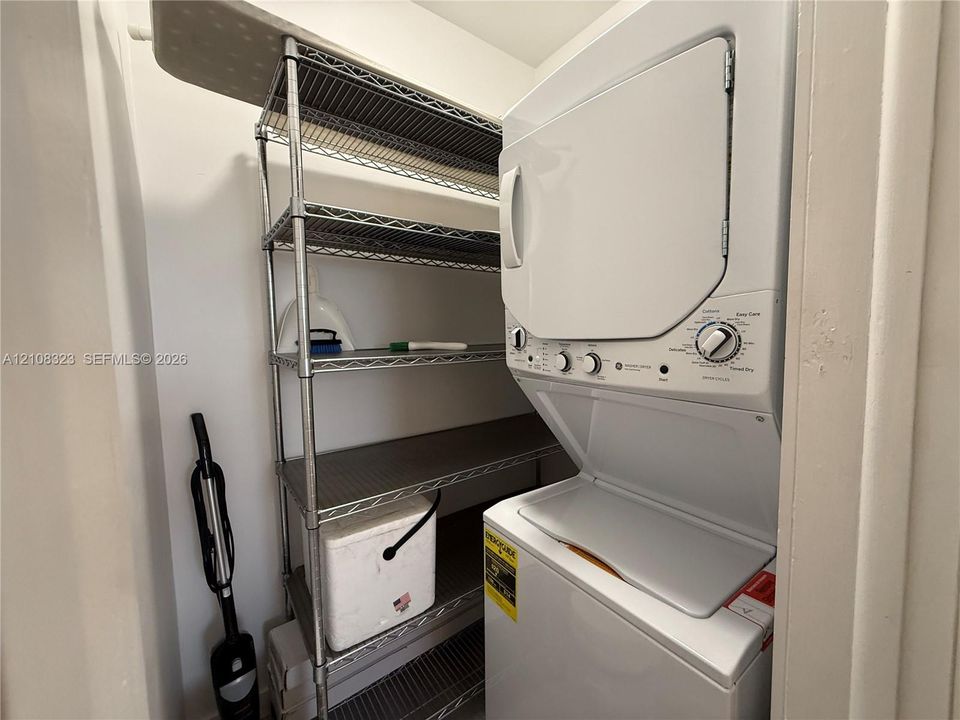 Stackable washer and dryer unit with built-in metal wire shelving