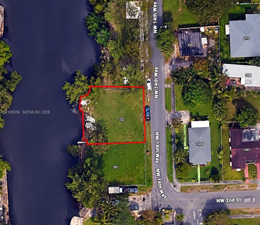 Property Survey. Aerial view indicating the boundary lines and parcel dimensions of the property