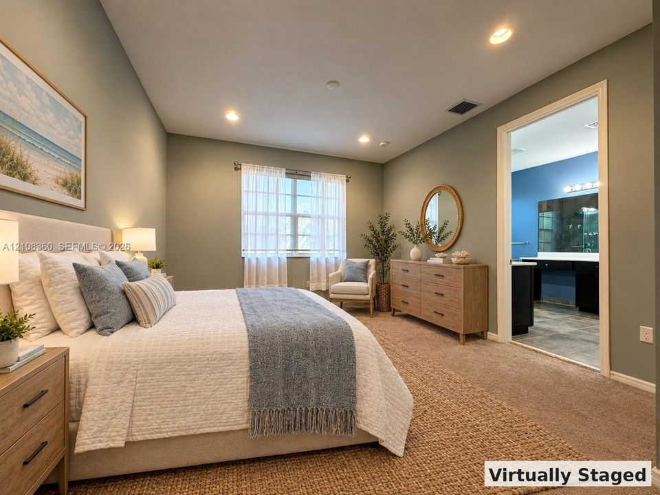 Bedroom featuring neutral wall paint, carpeted flooring, and recessed ceiling lighting