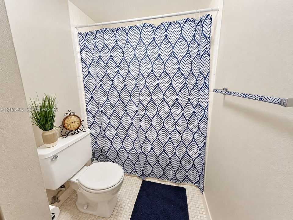 Master Full bathroom featuring white ceramic tile flooring