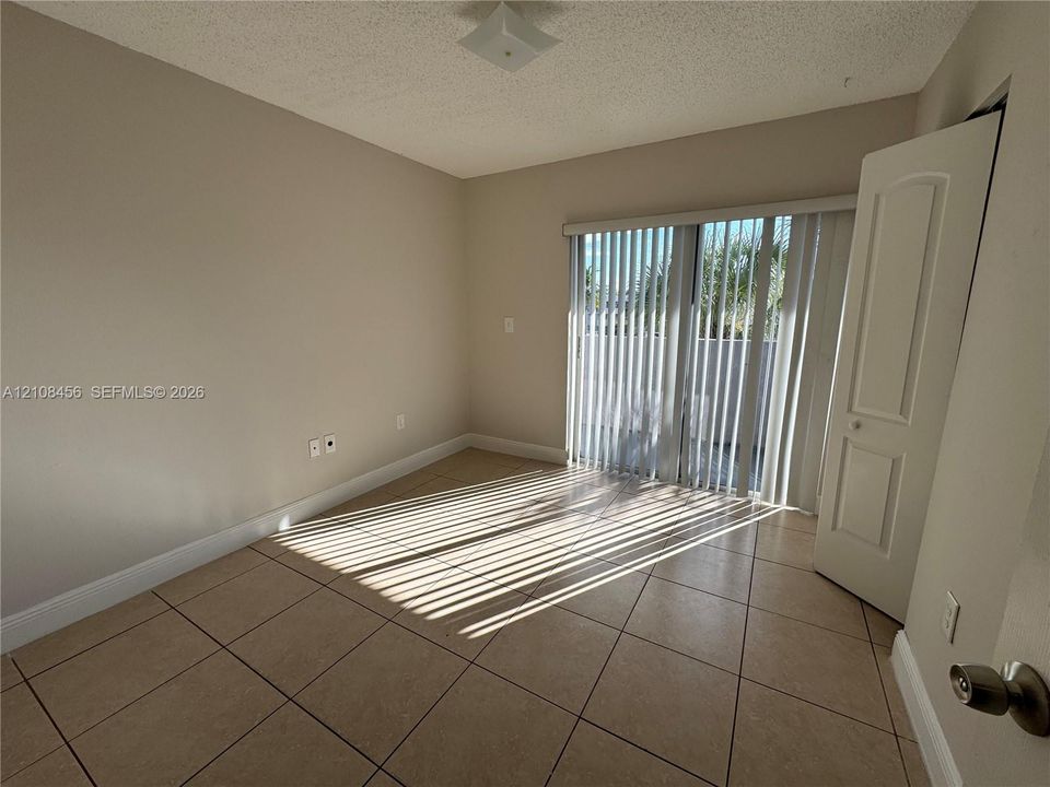 bedroom with balcony