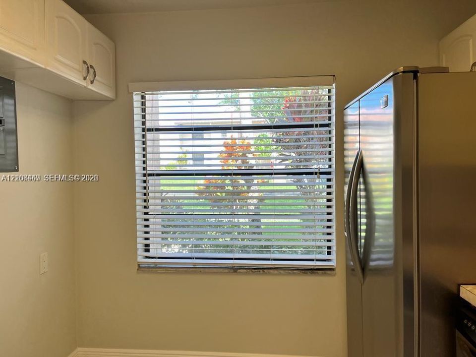 Stainless steel refrigerator extra space for a breakfast furniture