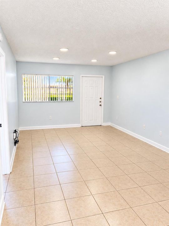 Bright Minimalist Room with Window and D