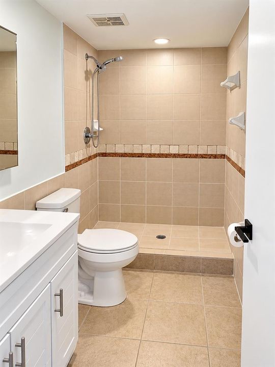 Modern Beige-Tiled Bathroom Interior