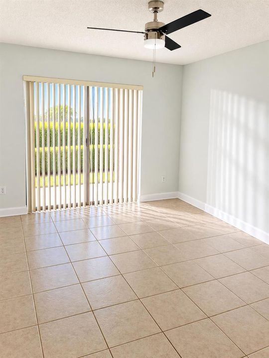 Bright Minimalist Room with Vertical Bli