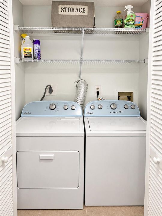 Bright Whirlpool Laundry Closet with Org