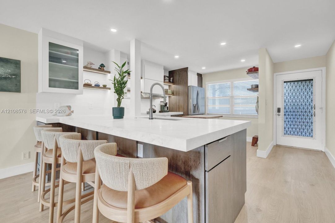 Dining Bar into the open concept kitchen