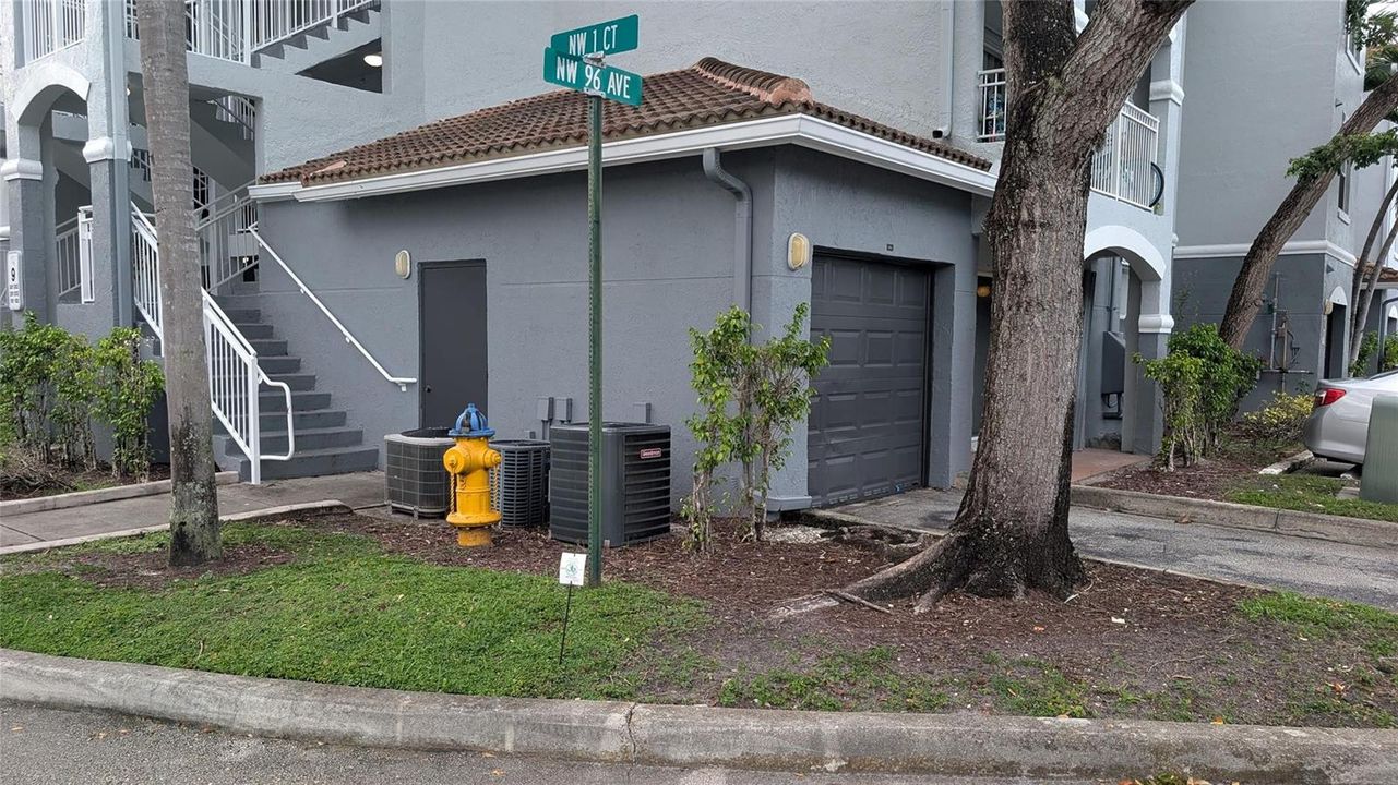 Unit's garage 9-1 and side door