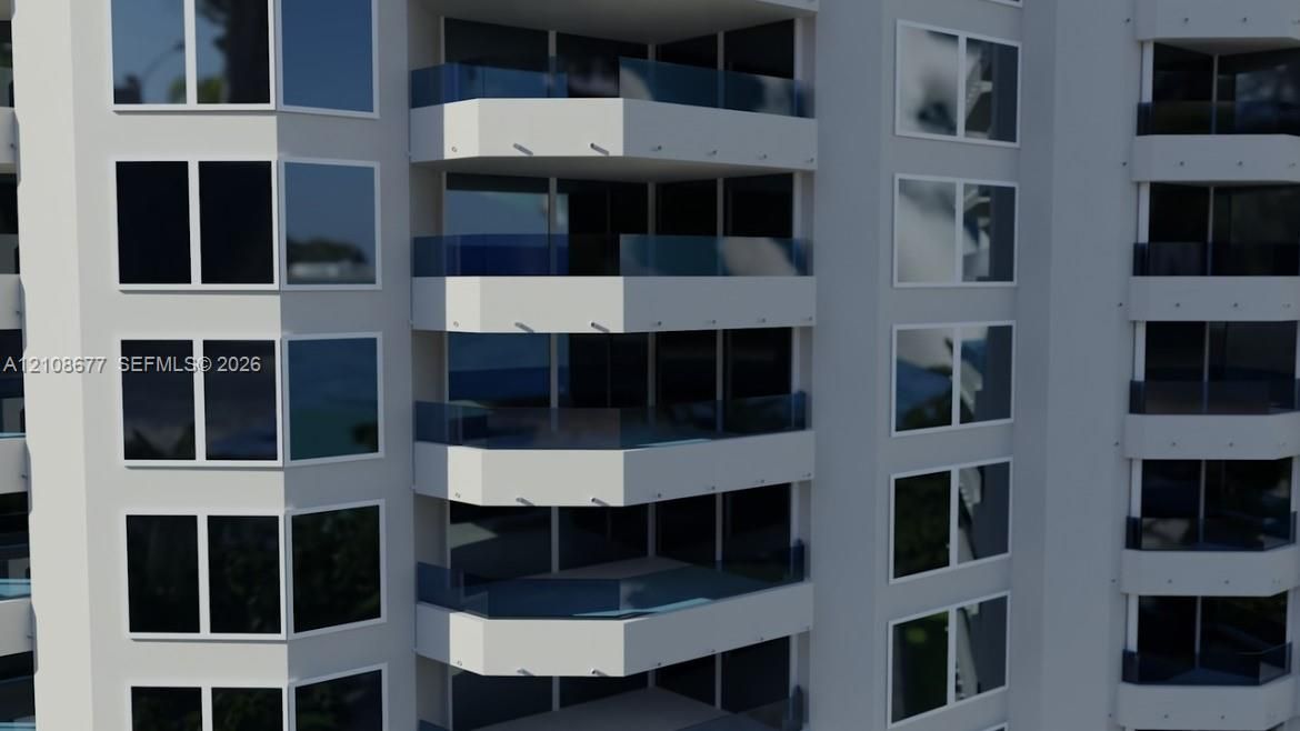 VIRTUAL RENDER of the building post construction. The glass railings are in, and all units now have impact windows and doors.