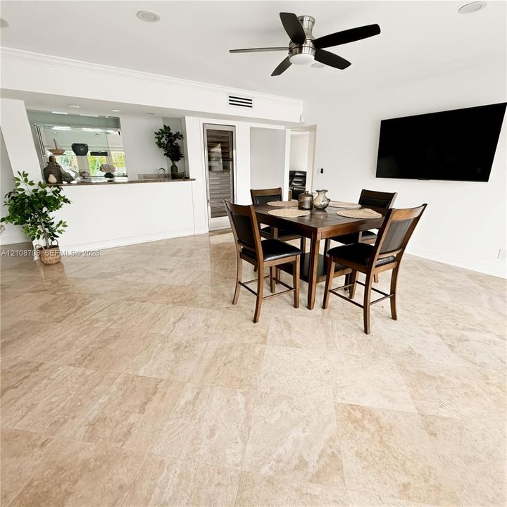 Open living and dining area with water views