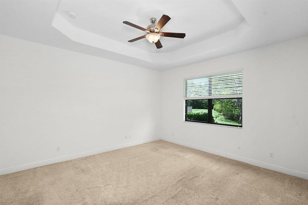 Primary bedroom has view of the preserve